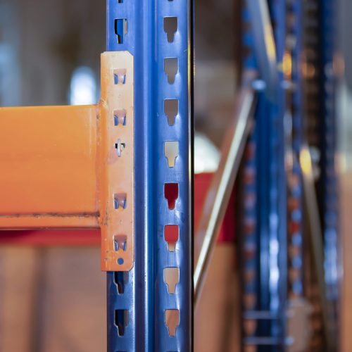 Metal joints of warehouse shelves.